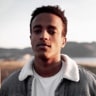 Profile photo of Victor Crest, a young man standing outside with a scenic landscape behind him